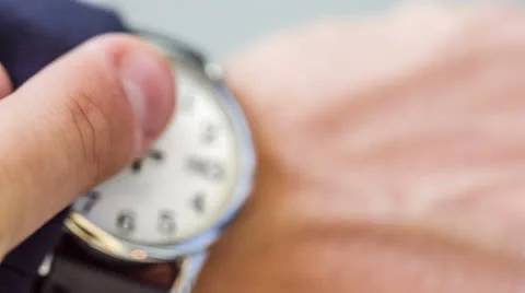 Checking Watch on Wrist for Time at 9 o'clock Morning Wristwatch Closeup Close Stock Footage