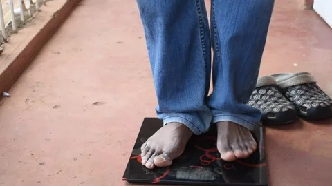 Checking weight Stock Footage 161893674