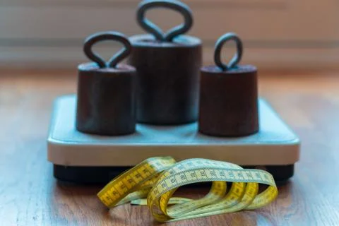 Checking weight on a scale and measure your size Stock Photos