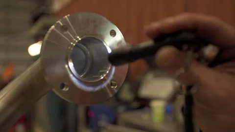 Checking weld quality stainless steel pipe Stock Footage 246516961