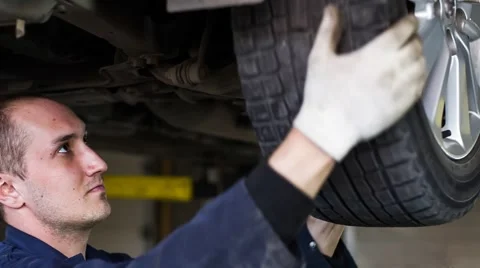 Checking the Wheel Stock Footage 67461462