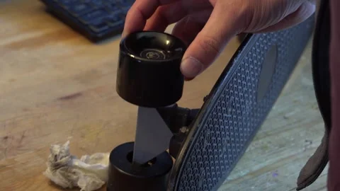 Checking the wheel on a skateboard 4K Stock Footage 275879977