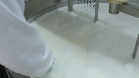 Checking the workpiece of cheese with a knife 库存影片 180090772