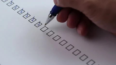 Checklist and To Do List Concept. Closeup businessman tick off on checklist Video stock 201316005