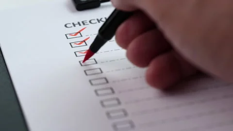 Checklist and To Do List Concept. Closeup businessman tick off on checklist Video stock 201316051