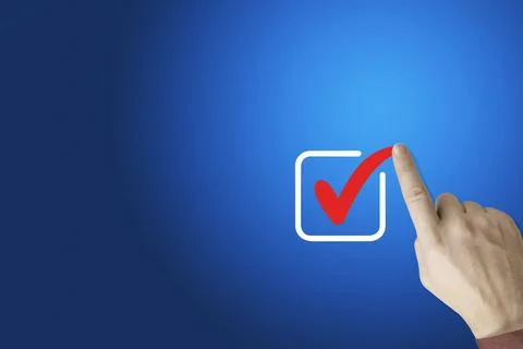 Checklist concept, Businessman checking mark on the check boxes with marker r Stock Photos