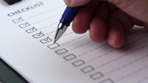 Checklist, To Do List, Action Plan Concept. After finishing a job on white paper Stock Footage 204761377