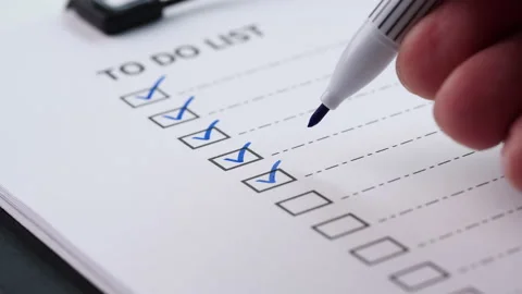 Checklist, To Do List, Action Plan Concept. After finishing a job on white paper Stock Footage 204764465