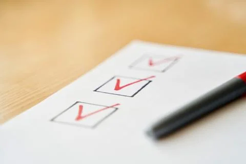 Checklist marked red with a red pen Stock Photos