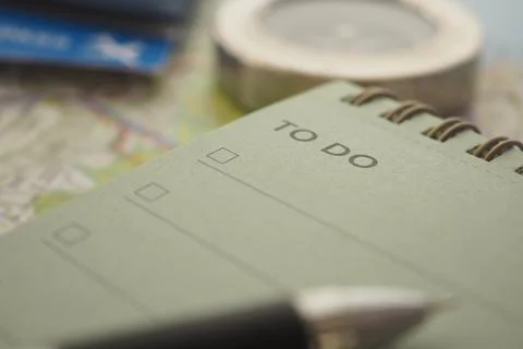 Checklist on a notepad with a pen and compass Stock Photos