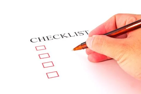 Checklist with pen and checked boxes. Foto stock
