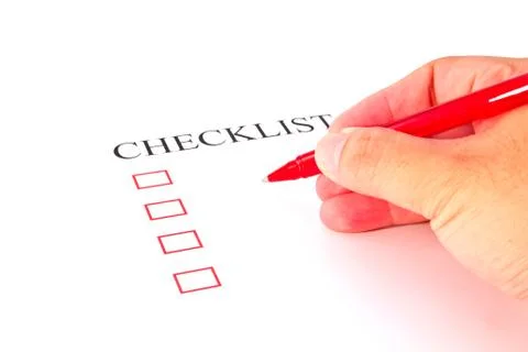Checklist with pen and checked boxes. Foto stock