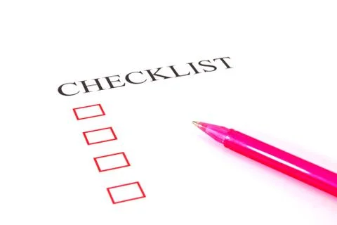 Checklist with pen and checked boxes. Stock Photos