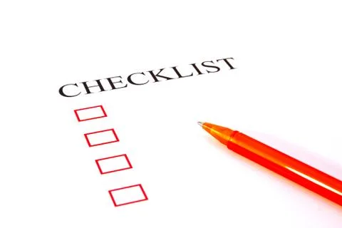 Checklist with pen and checked boxes. Stock Photos