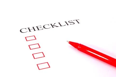 Checklist with pen and checked boxes. Stock Photos