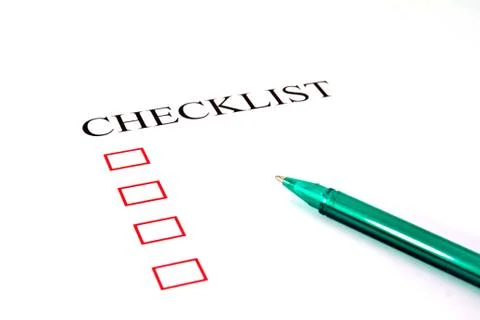 Checklist with pen and checked boxes. Stock Photos