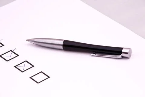 Checklist with a pen. Stock Photos