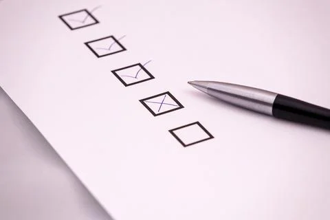 Checklist with a pen. Stock Photos