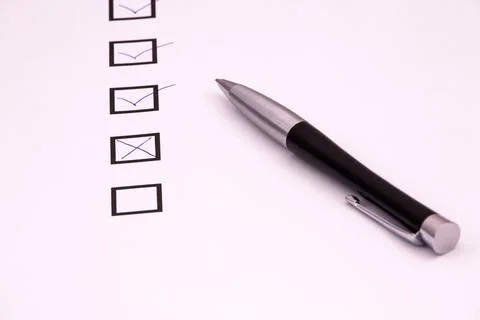Checklist with a pen. Stock Photos