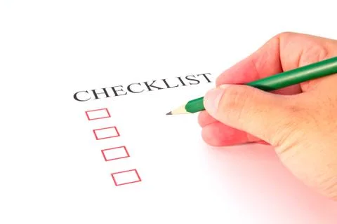 Checklist with pencil and checked boxes. Foto stock