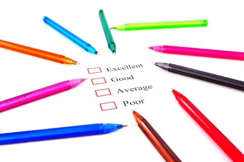 Checklist with pens and checked boxes. Foto stock