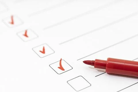 Checklist sheet and red marker. Check list completed task concept. Copy space Stock Photos