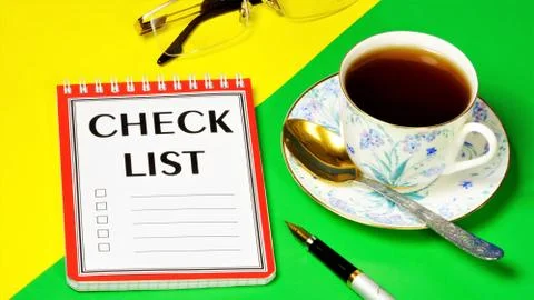 Checklist text label on the Notebook. Action plan for the future. Stock Photos