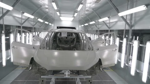 Checkman are checking assembling of cars before painting process. Car Stock Footage 163022409