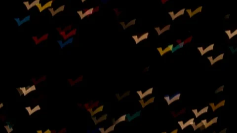 Checkmark Bokeh Multicolor and White Lights TILT DOWN Stock Footage 84708822