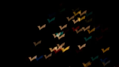 Checkmark Bokeh Multicolor and White Lights TILT UP Stock Footage 84708848