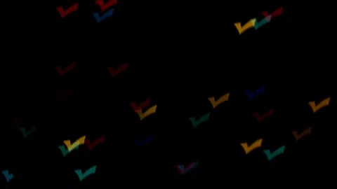 Checkmark Bokeh Multicolor Lights TILT DOWN Stock Footage 84708900