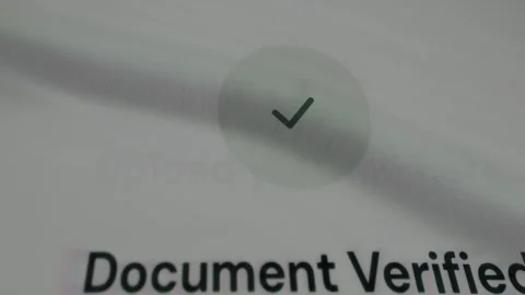 Checkmark symbol with message confirming a Document verification Stock Footage 333833951