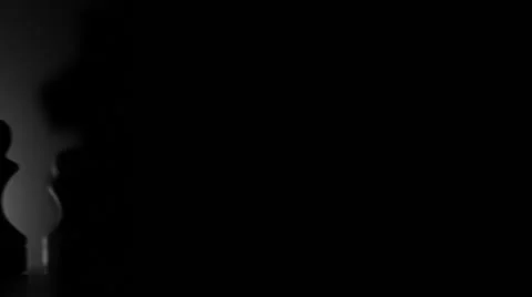 Checkmate in game of chess in dark room 動画素材 64914228