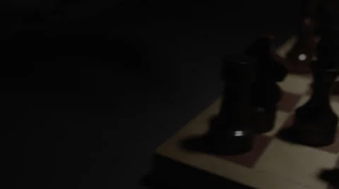 Checkmate in game of chess in dark room 動画素材 64914370