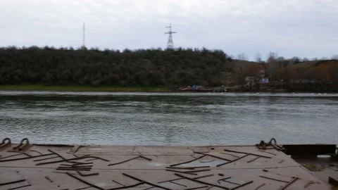 Checkpoint Yampil - Koseuts. Ferry crossing on the Dniester river. Stock Footage 147343980