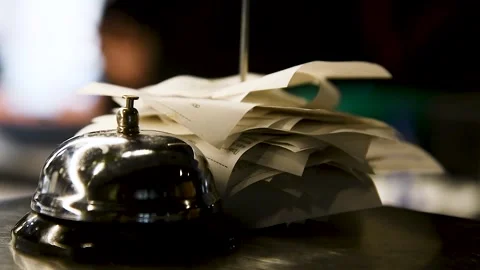 Checks from completed orders in the bar or restaurant kitchen impaled on a sh Stock Footage 209145584