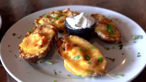 Cheddar bacon potato wedges Stock Footage 131919257