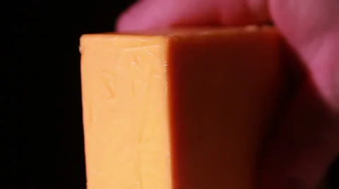 Cheddar Cheese being Cut Stock Footage 36047513