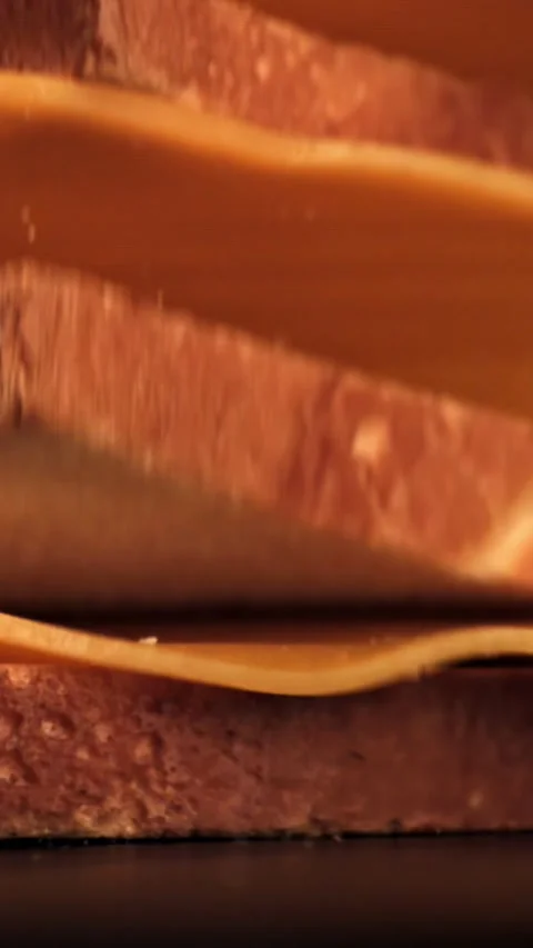 Cheddar cheese bread falls on the table. Filmed on a high-speed camera at 1000 Stock Footage 335377067