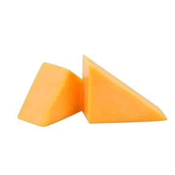 Cheddar cheese cube and slice isolated on plain white background side view Stock Photos