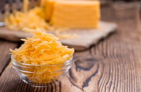 Cheddar cheese (grated) Stock Photos
