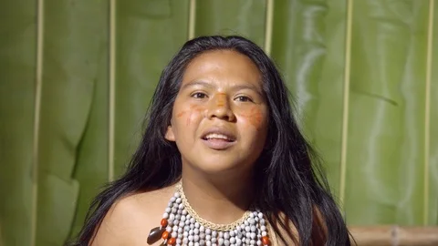 Cheeks slapping by a young girl like getting worm or after applying an itchy Stock Footage 113181906