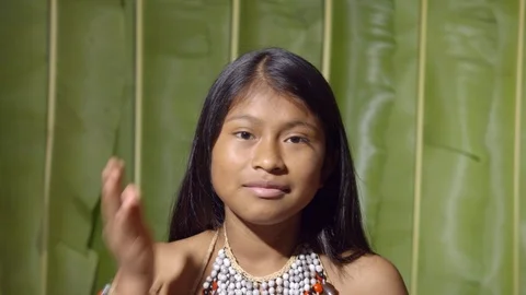 Cheeks slapping by a young girl like getting worm or after applying an itchy Stock Footage 113182388