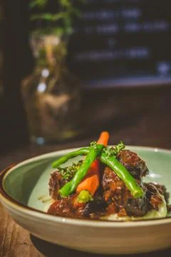 Cheeky Git Braised beef cheek stew with french beans and housemade mash 写真素材
