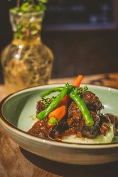 Cheeky Git Braised beef cheek stew with french beans and housemade mash 写真素材