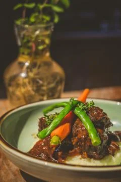 Cheeky Git Braised beef cheek stew with french beans and housemade mash 写真素材