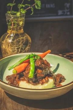 Cheeky Git Braised beef cheek stew with french beans and housemade mash 写真素材