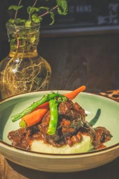 Cheeky Git Braised beef cheek stew with french beans and housemade mash 写真素材