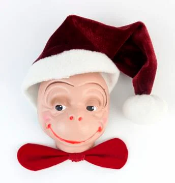 Cheeky Santa monkey Stock-Fotos