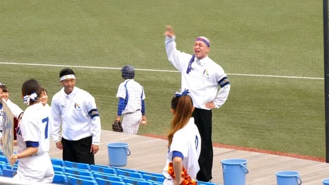 Cheerers on the sidelines of the Meiji Jingu Baseball Stadium in Tokyo Japan Stock Footage 125780909
